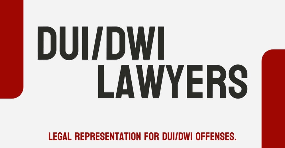 Image of DUI/DWI lawyers discussing legal strategies, representing professionals specializing in cases involving driving under the influence.