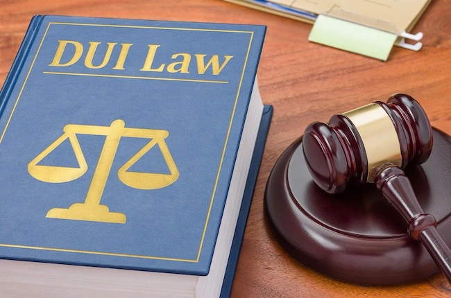 DUI law book and gavel displayed together, illustrating Chudnovsky Law's legal representation for clients facing second DUI charges in Los Angeles.