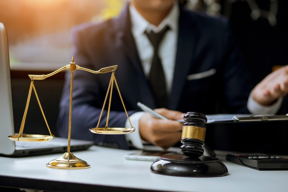 Los Angeles pre-filing investigation lawyer consulting with a client, illustrating why hiring a pre-charge attorney can change the outcome of a criminal case.
